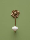 Golden rose hook with ceramic ball