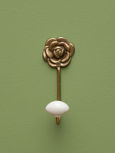 Golden rose hook with ceramic ball