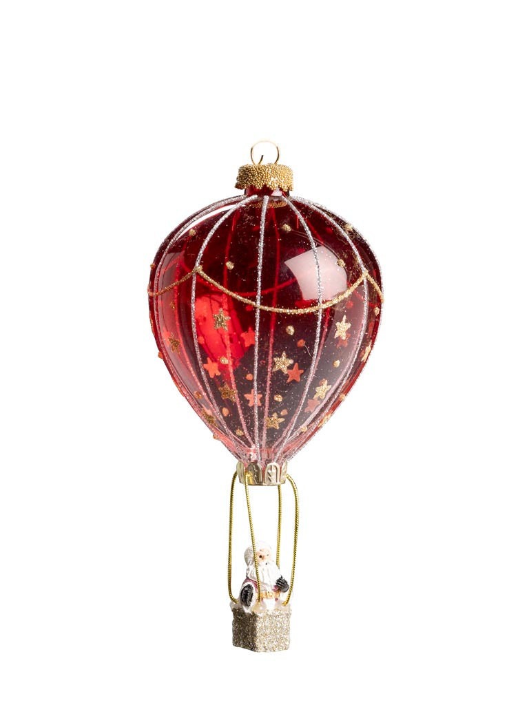 Transparent hot air balloon and Santa Claus