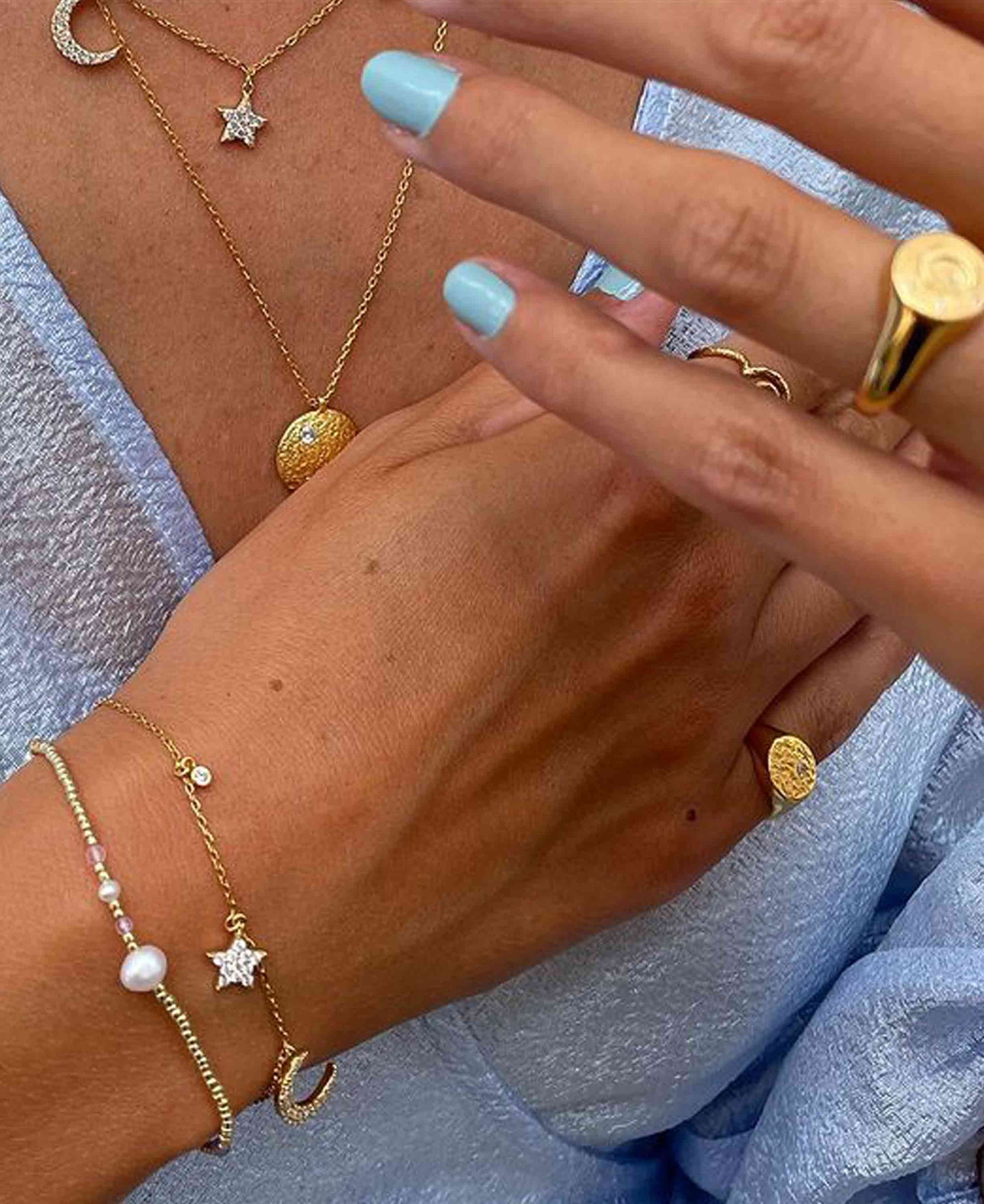 Golden Cosmo necklace by Hultquist Copenhagen