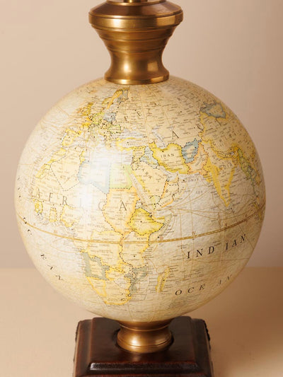 Table lamp with globe